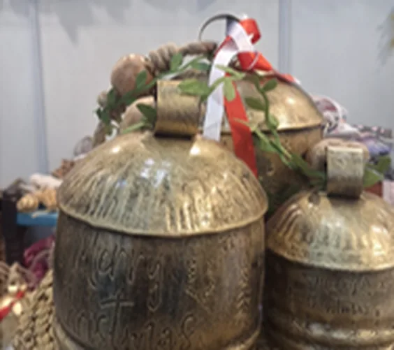 Handmade metal bells manufacturer India — pair of hand-forged brass-finished bells