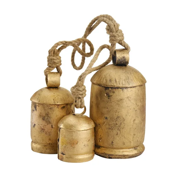 Rustic iron cow bells with a brass-copper finish hanging on natural jute rope