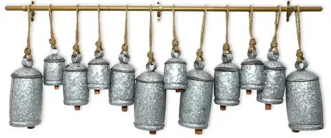 Group of rustic handmade bells with golden patina