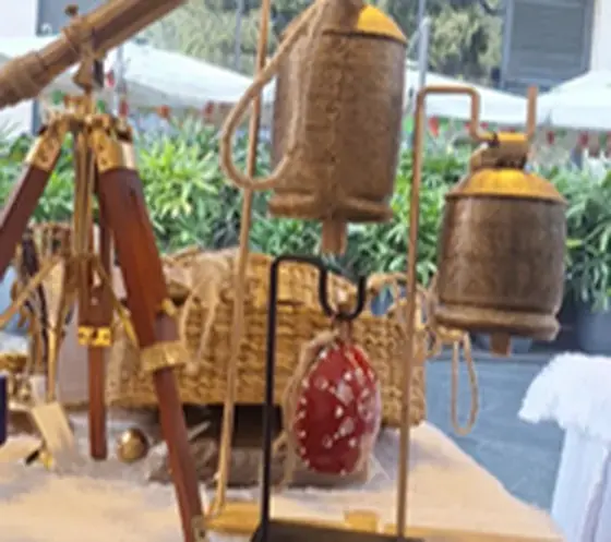 Bell clusters on jute rope on a display frame